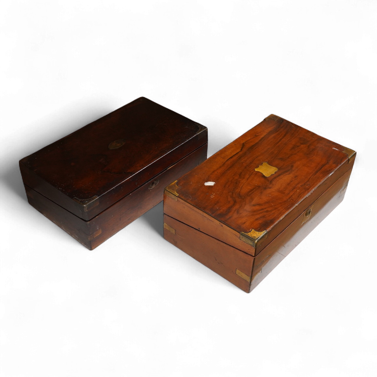 A Victorian walnut rising slope together with a rosewood writing slope